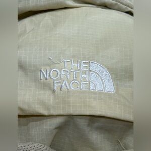 North face back pack cream color